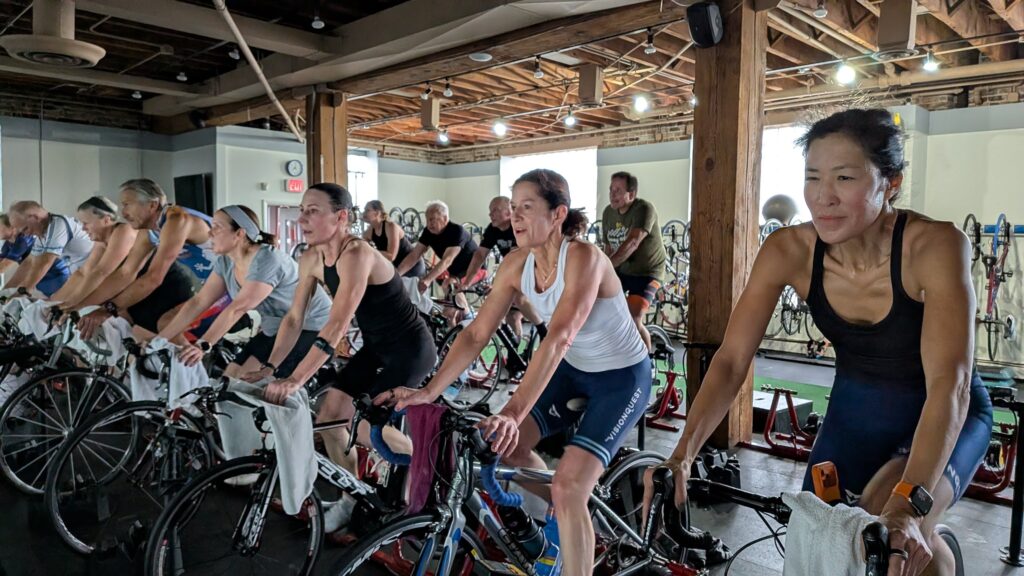 A Vision Quest indoor cycling class in session